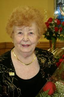 6. Rose Giannini Lood, holding roses given to her by Boy Scout Troop 20 in the New Utrecht Reformed Church Parish Hall where a celebration of her 90th birthday was held while construction continues during a $2 million repair and restoration of the nearby sanctuary, which dates back to 1828. The Scouts gave Mrs. Lood nine roses, one for each decade of her life.